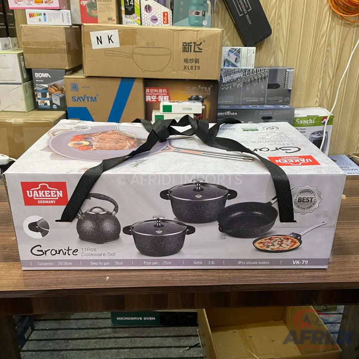 A boxed granite 11-piece cookware set.