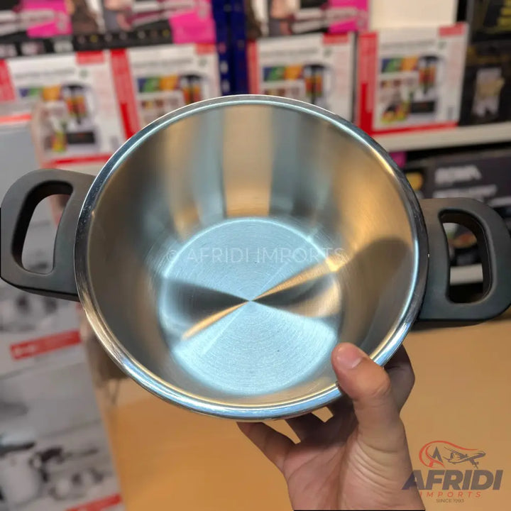 Stainless steel cooking pot with black handles.