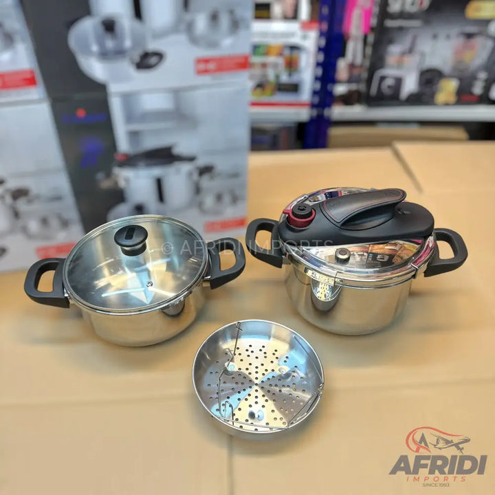 A stainless steel cookware set including a pressure cooker, a pot with a glass lid, and a steamer insert.