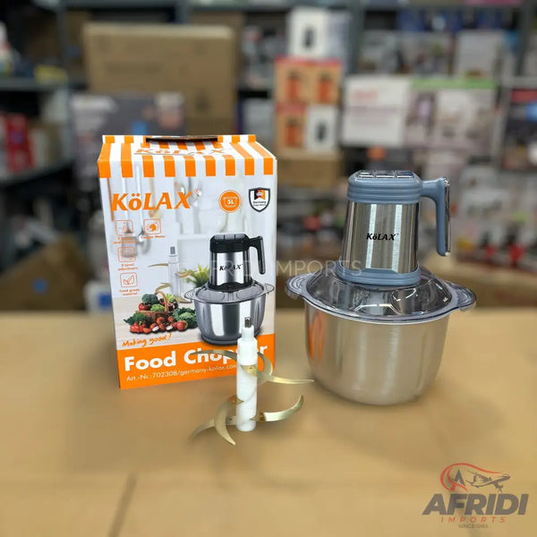 A stainless steel food chopper with a grey and blue top.