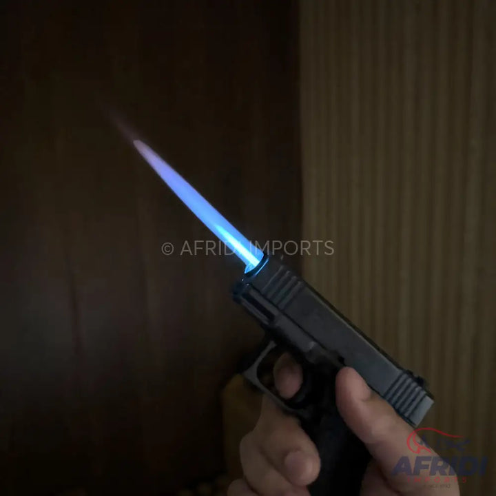 Black pistol-shaped lighter with a blue torch flame.