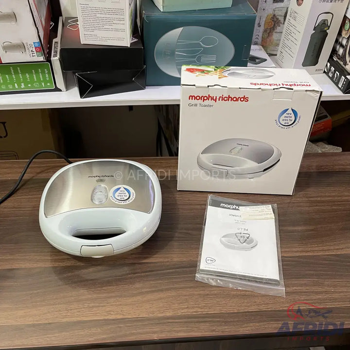 White and silver Morphy Richards Grill Toaster.