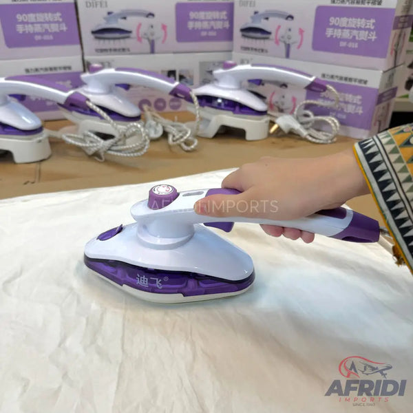 A handheld purple and white garment steamer with a foldable handle.
