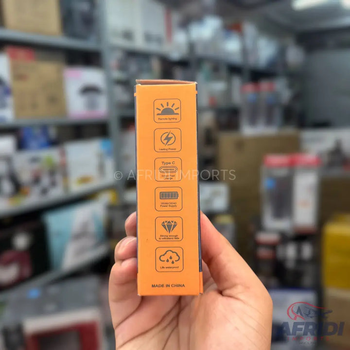 Orange product packaging with feature icons and ’MADE IN CHINA’ text.