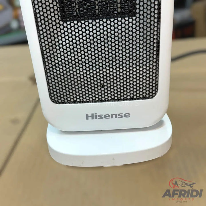 White electric fan heater with a black mesh grill.