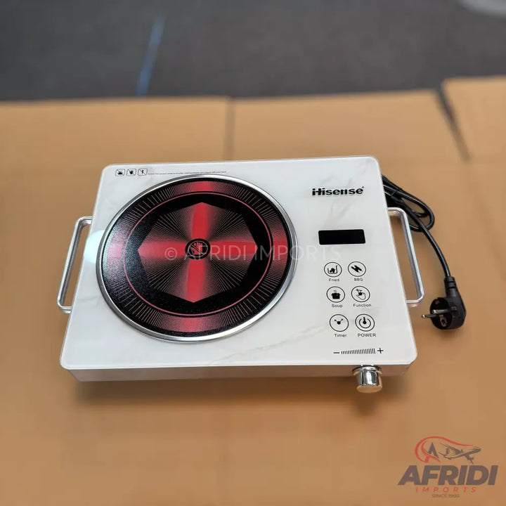 White portable induction cooktop with a single burner and control panel.