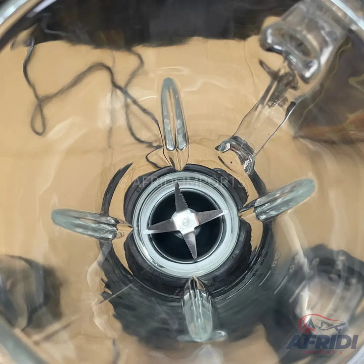 Blender jar with a four-blade assembly.