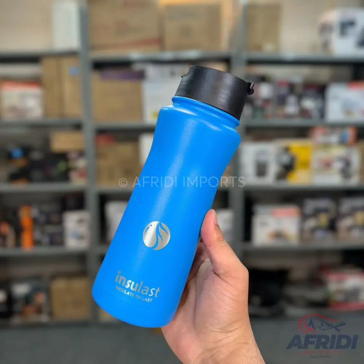 Blue insulated water bottle with a black flip-top lid.