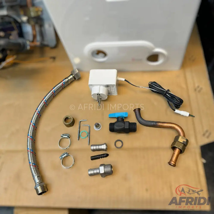 A collection of plumbing and electrical components for a water heater.