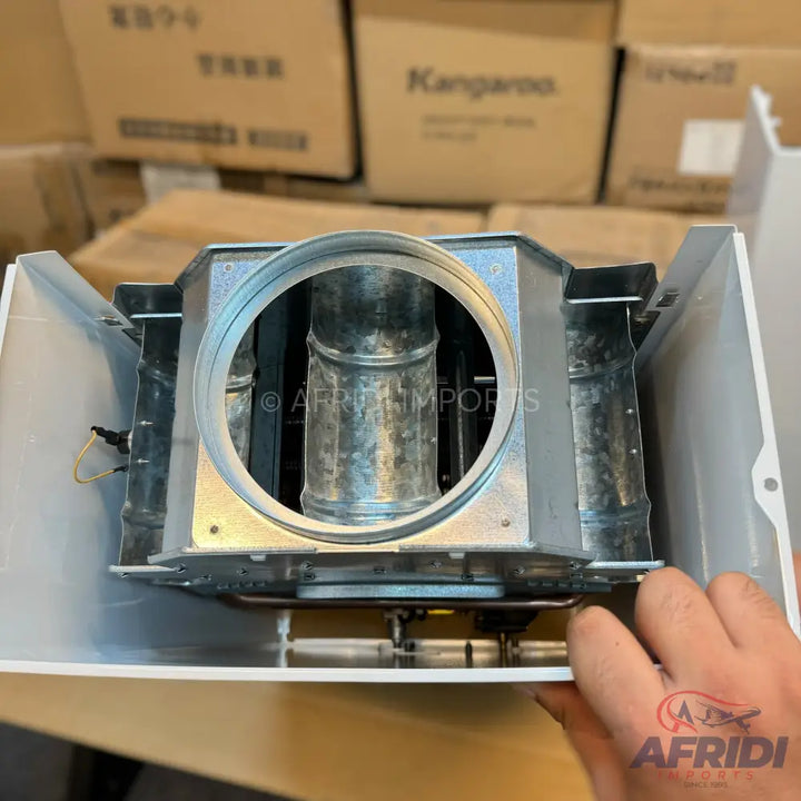 A white, rectangular bathroom exhaust fan with a galvanized metal duct connection and internal components visible.