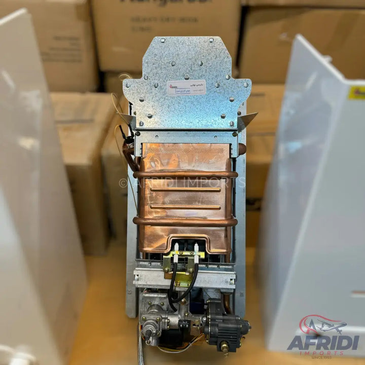 An internal view of a gas water heater without its outer casing, revealing the copper heat exchanger and various mechanical components.