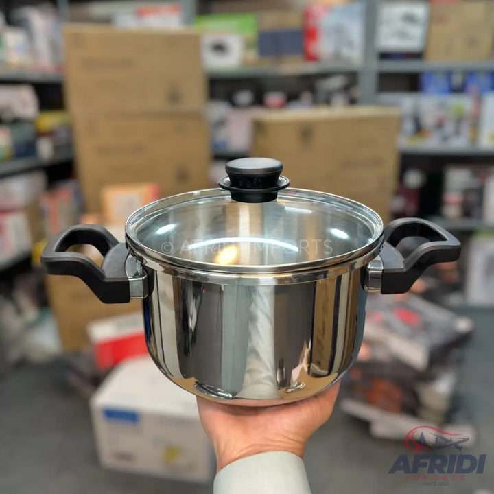 Stainless steel cooking pot with a glass lid and black handles.