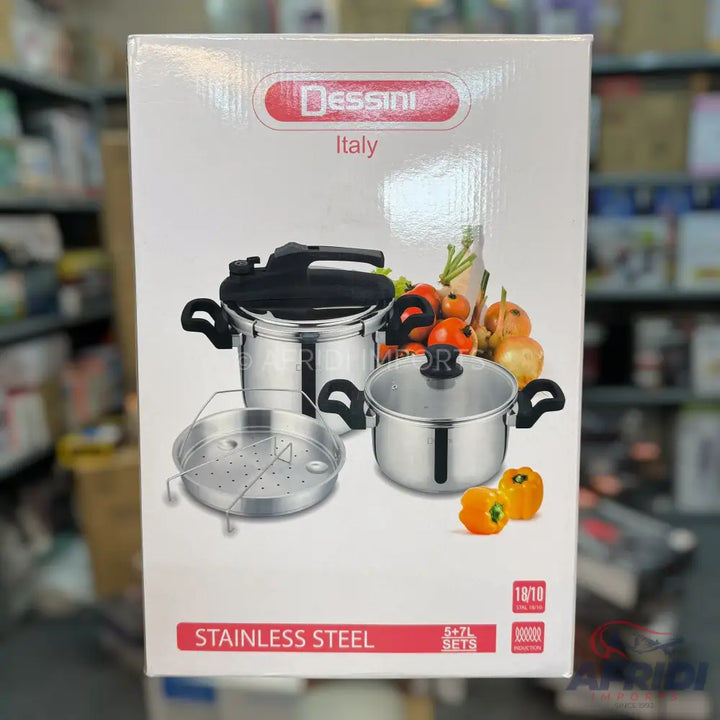 A set of stainless steel pressure cookers and pots.