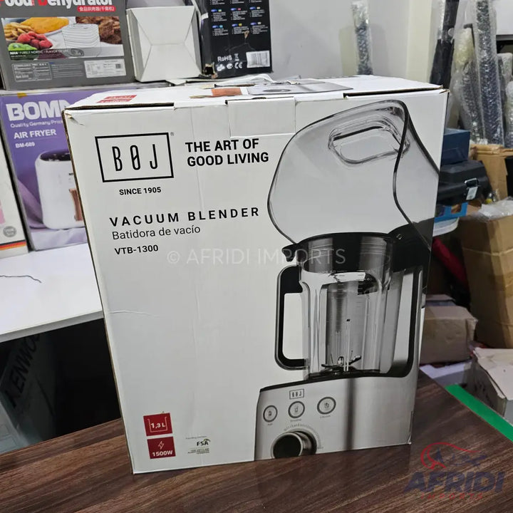 Boxed vacuum blender with a 1.3L capacity and 1500W power.
