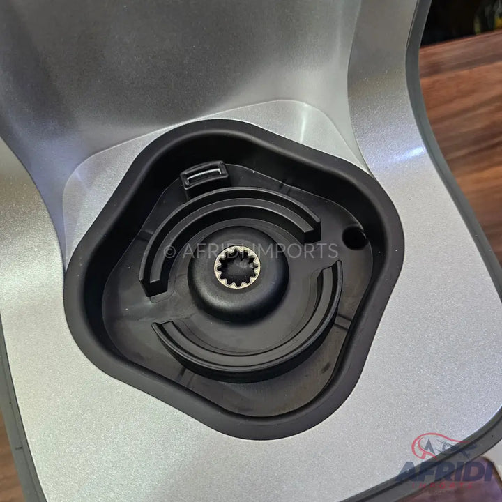 The base of a blender or food processor with a drive coupling.