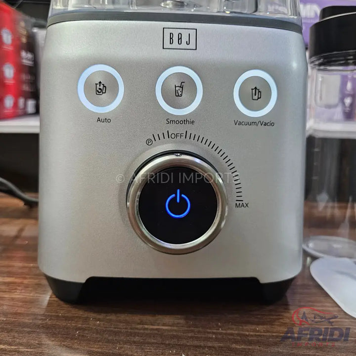 Silver and black kitchen blender with three pre-set functions and a power dial.