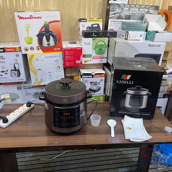 A dark brown and silver electric pressure cooker with a digital display and control buttons.