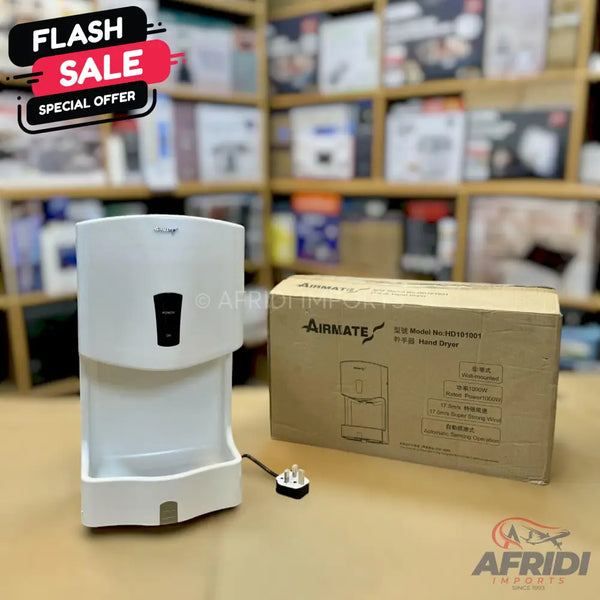 White automatic hand dryer with a power cord and plug.