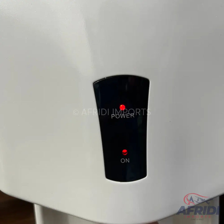 White appliance with a black control panel and two red indicator lights, one for ’POWER’ and one for ’ON’.