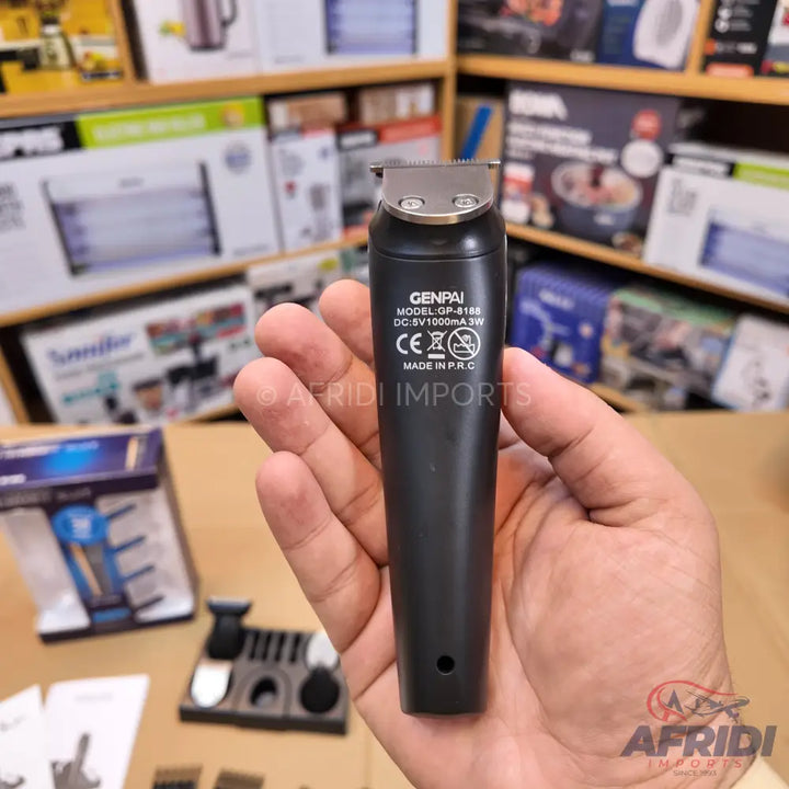 Black electric hair trimmer with a silver blade.