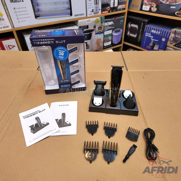 A black and gold professional trimmer kit with multiple attachments and guide combs.