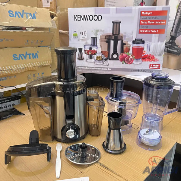 A Kenwood multi-pro juicer, blender, and food processor set with various attachments.