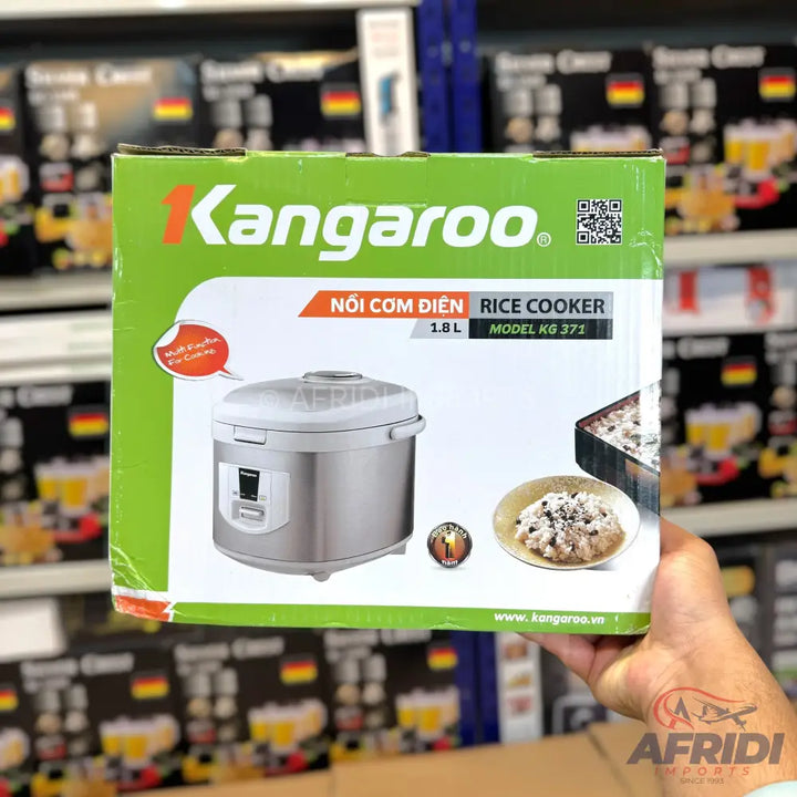 A packaged electric rice cooker with a 1.8L capacity.