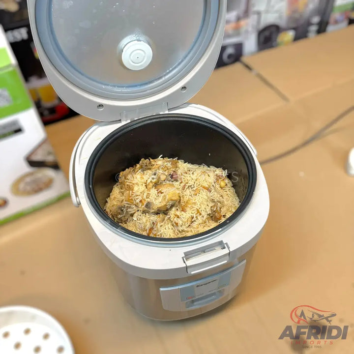 An open white and silver rice cooker filled with cooked biryani.