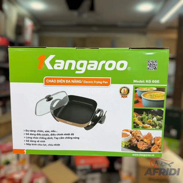 A packaged electric frying pan with a glass lid.