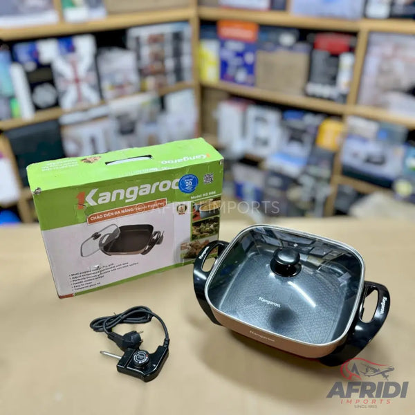 A square electric skillet with a glass lid and a detachable power cord.