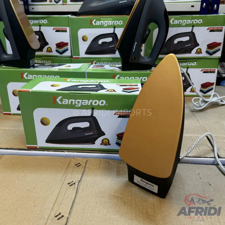 A black and gold dry iron with a fabric-covered cord.