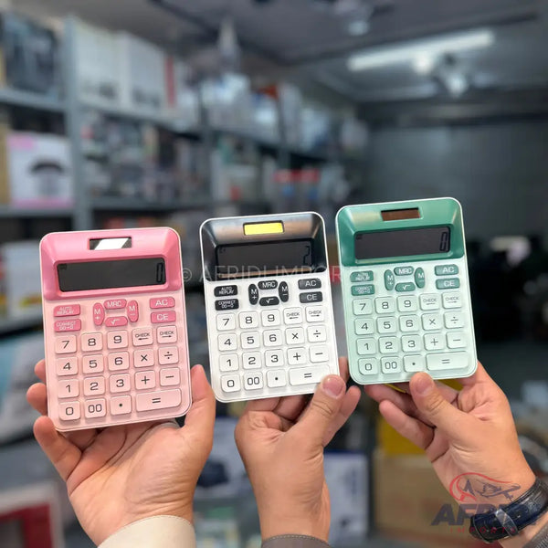 Three hands holding three different colored calculators.