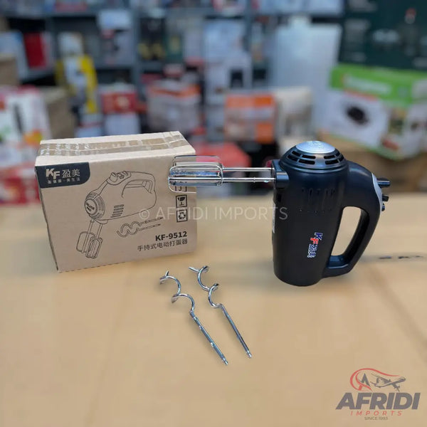 A black hand mixer with two whisk attachments and its product packaging.