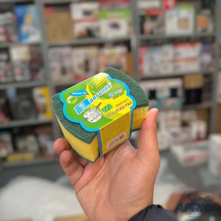 A two-pack of yellow and green heavy-duty scouring pads.