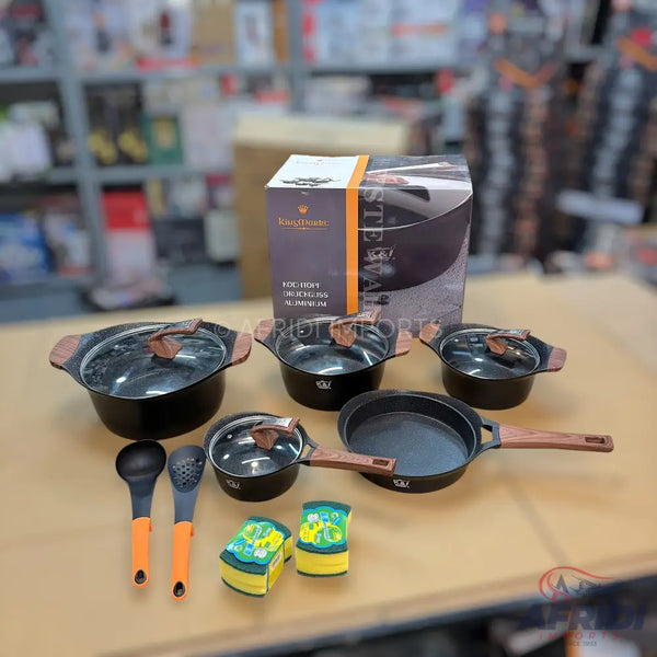 A black non-stick cookware set with wood-look handles and glass lids.
