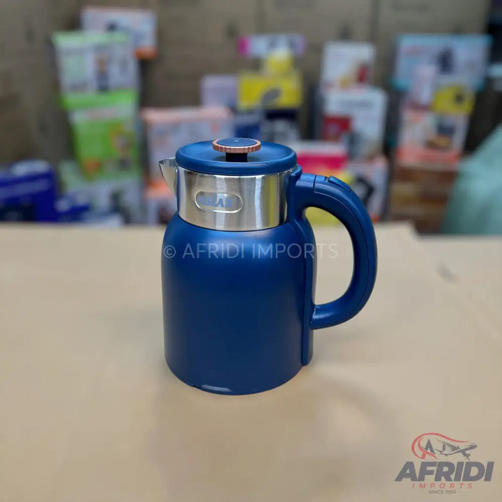 A blue electric kettle with a silver and rose gold-colored top.