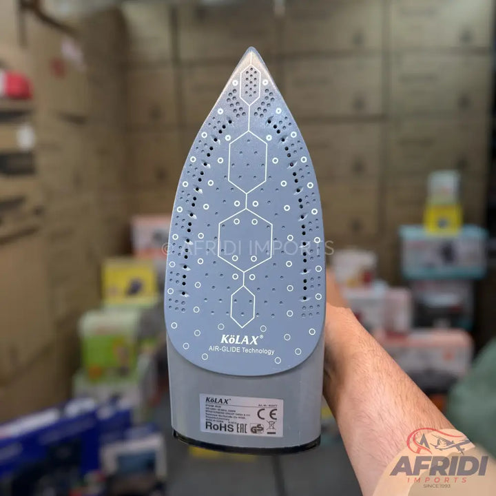 Gray steam iron with a textured soleplate designed for smooth gliding.