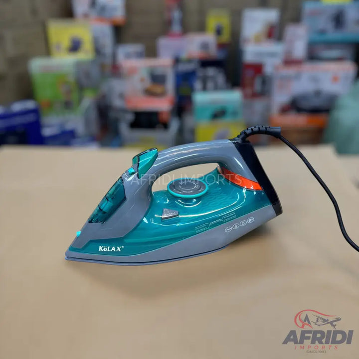 Teal and grey steam iron with a black power cord.
