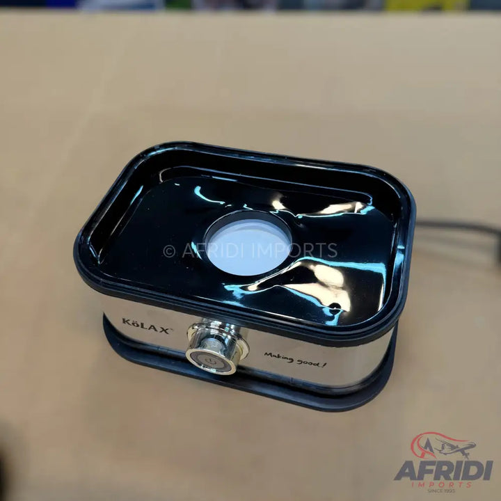 Black and silver portable electric warmer.