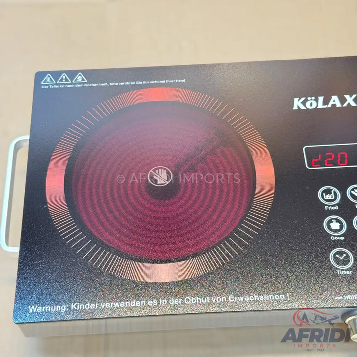 Black and red single-burner induction cooktop with digital display and touch controls.