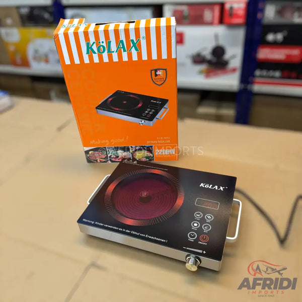 A single-burner electric cooktop with a black ceramic surface and silver handles.