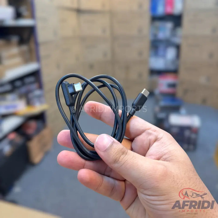 Black USB-C to right-angle USB-A charging cable.