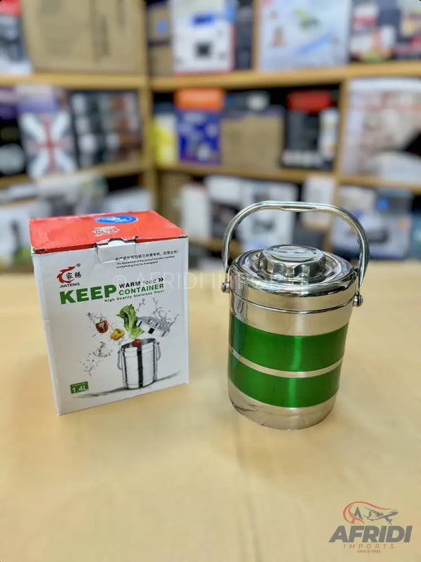 A green and silver multi-tiered insulated food container with a handle.