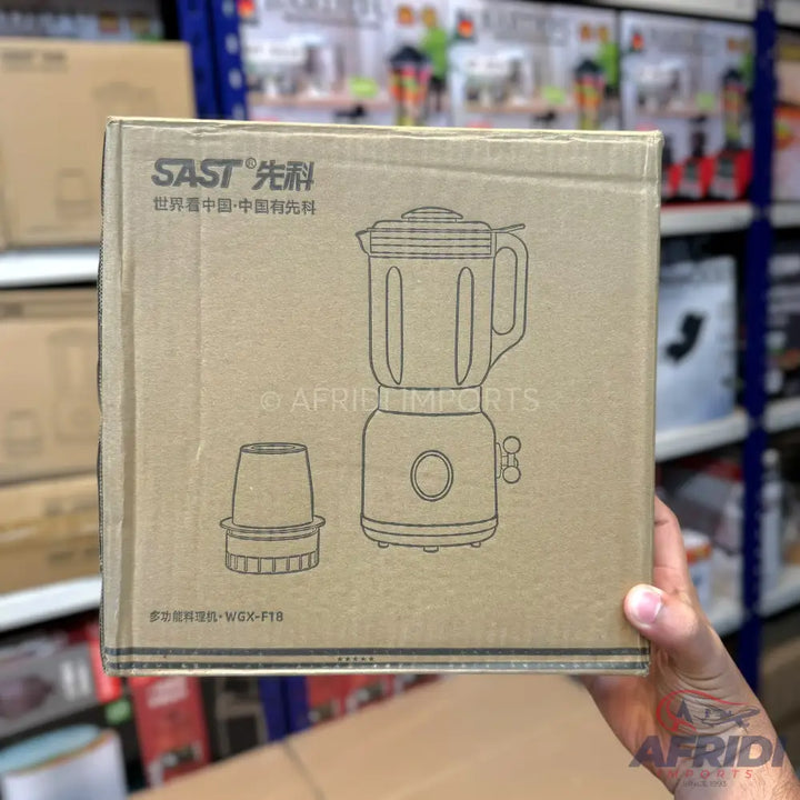 Cardboard box for a blender with a separate grinding attachment.