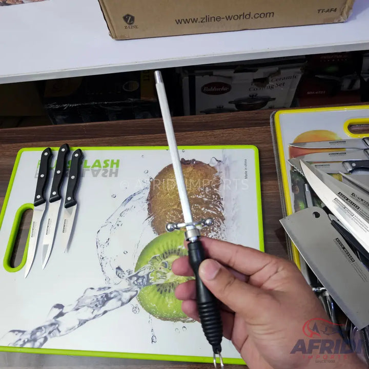 A ceramic knife sharpening rod with a black handle.