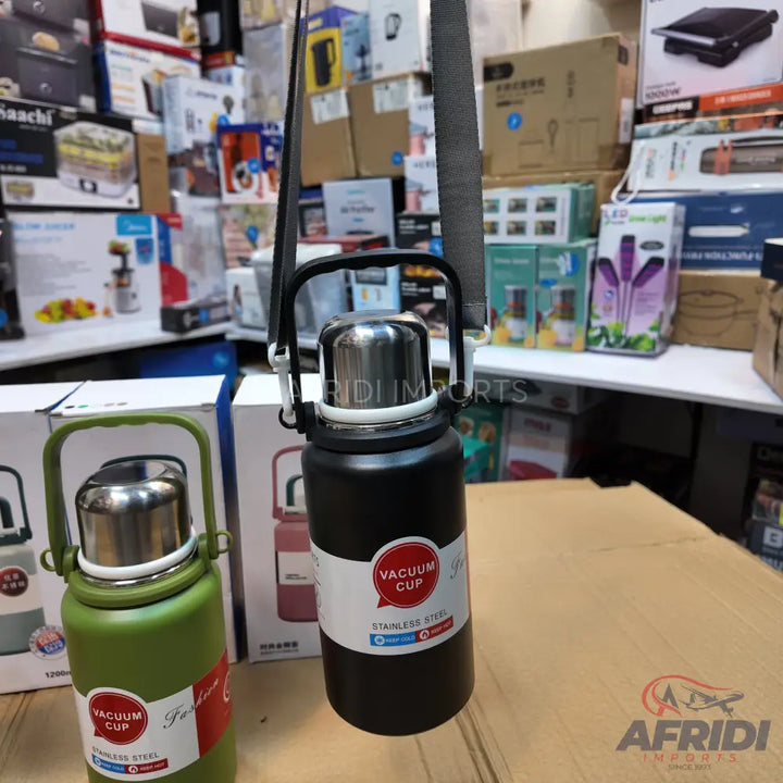 Black and green vacuum insulated water bottles with handles and shoulder straps.