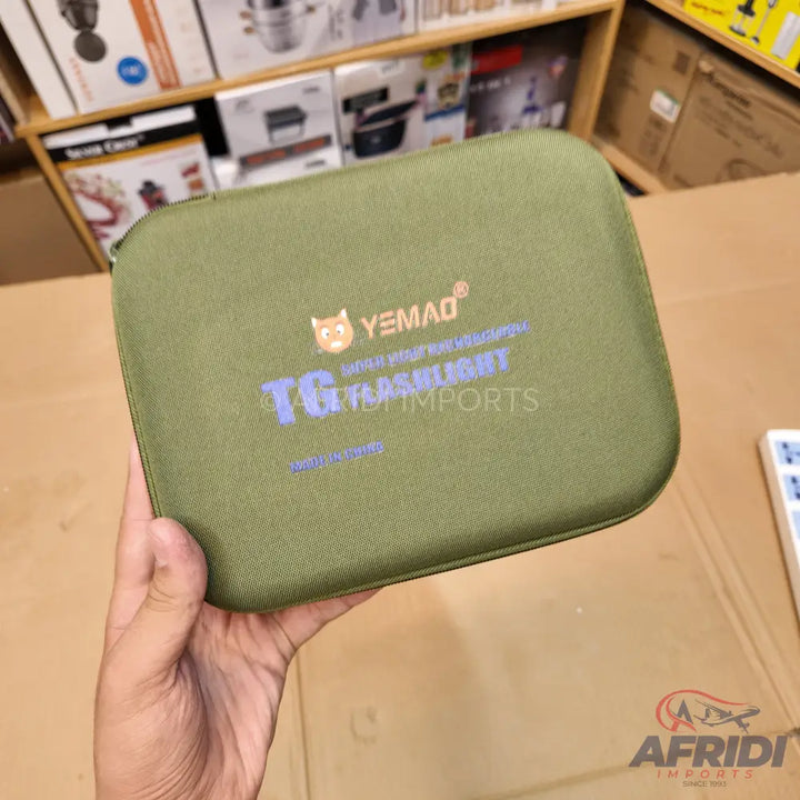 Olive green rectangular zippered case.