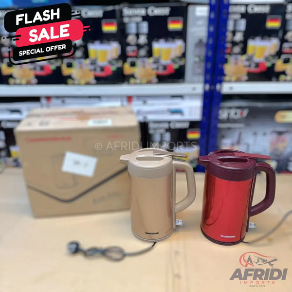 Two electric kettles in gold and red.