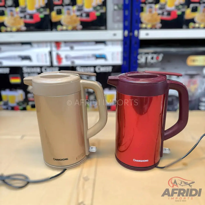 Two electric kettles in gold and red.