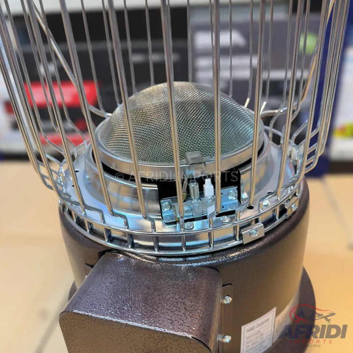 A portable, metallic, cylindrical gas heater with a protective cage.